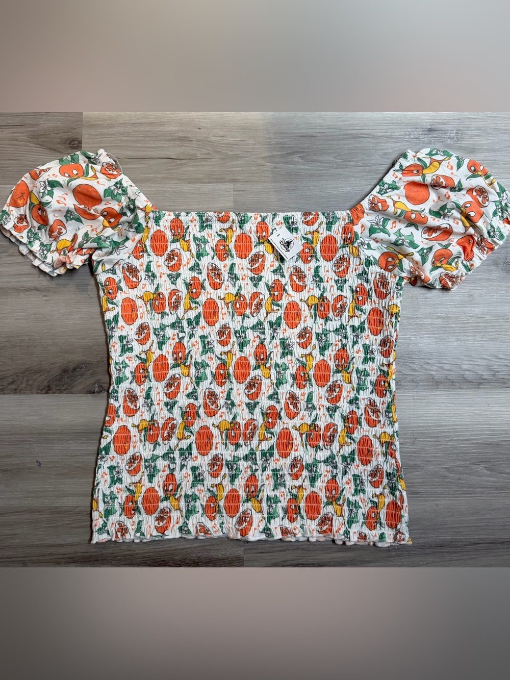 Disney White Smocked Crop Top with Orange & Green Citrus Print
